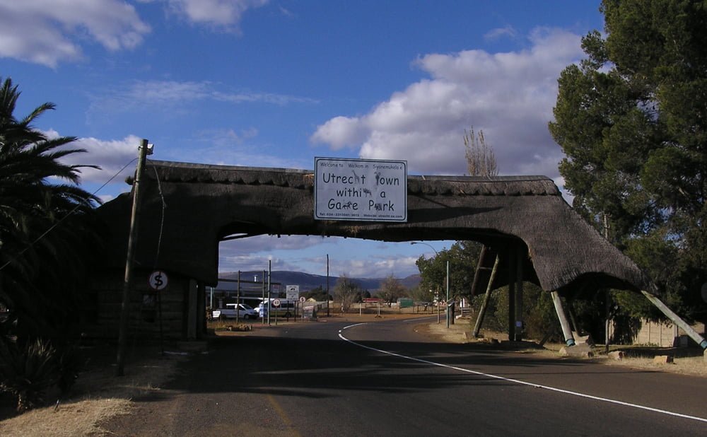designer pool covers A bridge over a road. This bridge provides a secure passage for pedestrians and vehicles, spanning above the bustling traffic below.